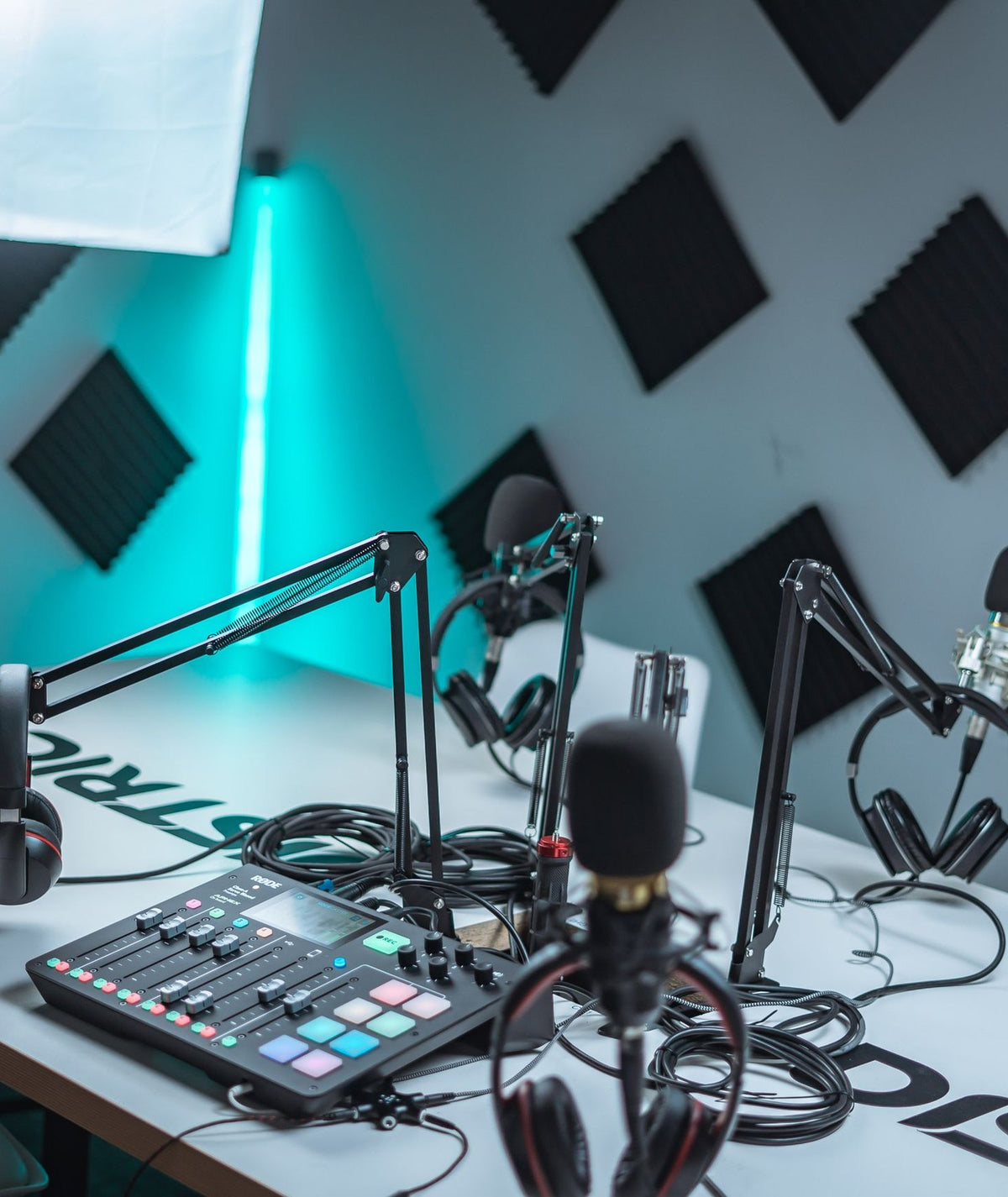 Podcast desk with microphones and mixer